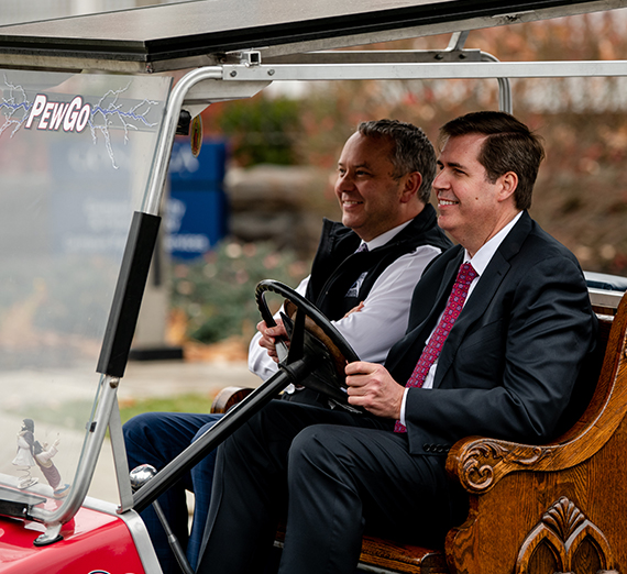 Spokane Mayor David Condon and GU President Thayne McCulloh drive on Sharp Ave