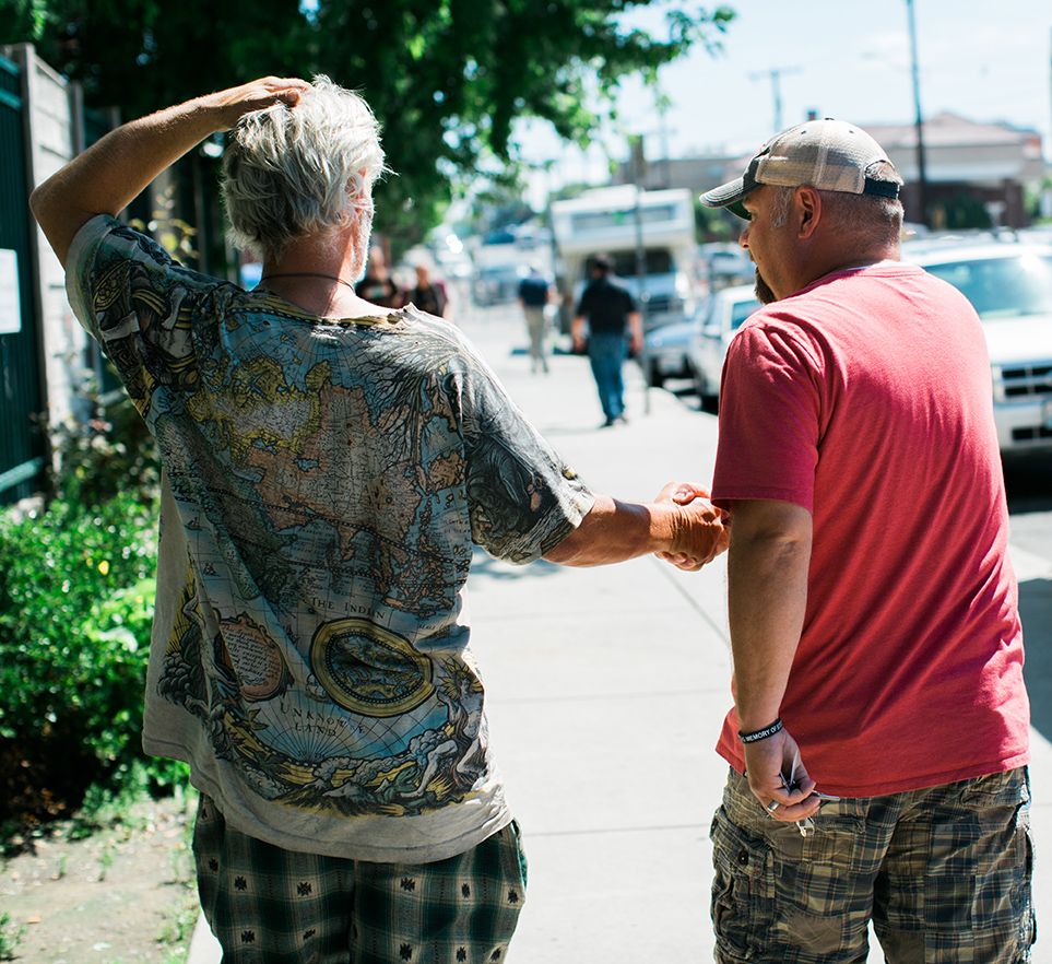 Rick Clark provides backpacks of hope.  (Photo courtesy Jennifer DeBarros)