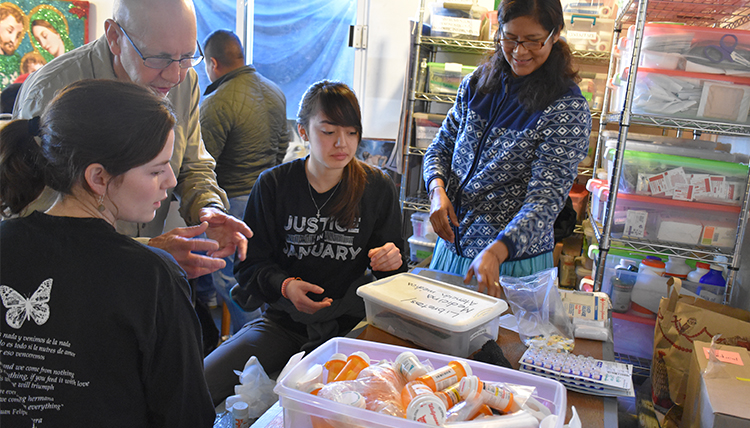 Gonzaga students sort medications for migrants served at Kino Border Initiative in Nogales Mexico