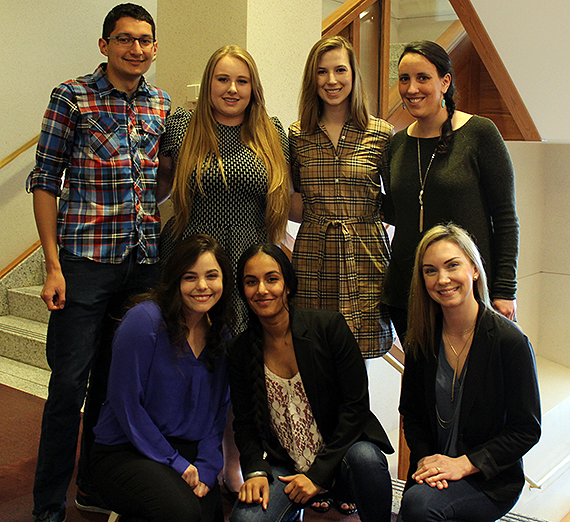 Standing (from left): Ryne Smith, Micaela Meadows, Colleen Penny, Rebecca Smith.  Front row (from left): Sara Duross, Gurpreet Dhatt, Lesley Gangelhoff. Photo courtesy GU Law.