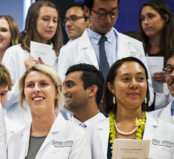 Students celebrate at the White Coat Ceremony in the Hemmingson Ballroom on Sept. 1, 2017. GU photo by Gavin Doremus.