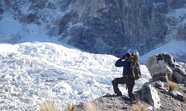 Gonzaga alum Dan Futrell on a mountain searching for plane debris