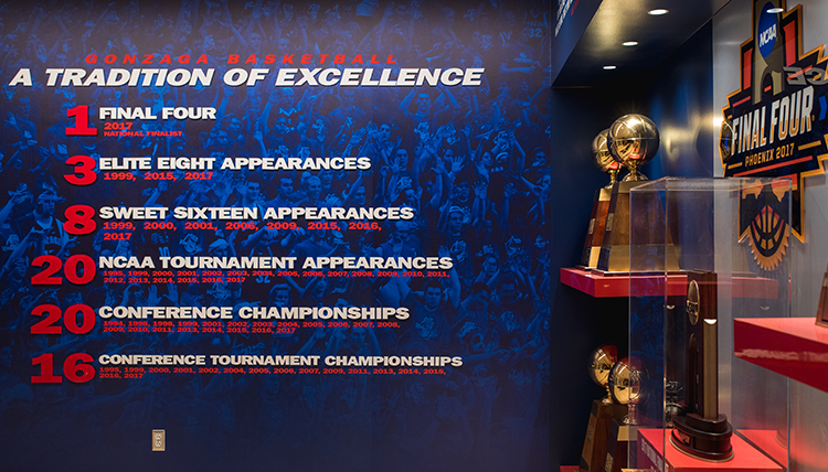 wall at Volkar Center reads Tradition of Excellence, includes NCAA stats