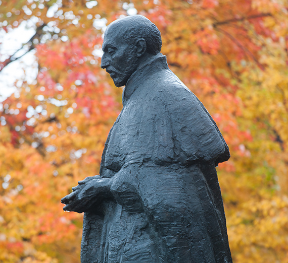 St. Ignatius of Loyola statue in front of College Hall. (GU photo) 