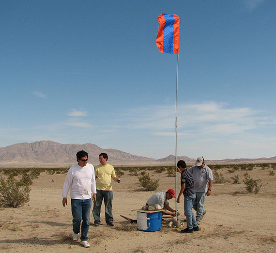 people install a water station in the desert near the CA - Mexico border 