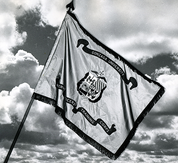 Gonzaga ROTC Standard flag waving in front of clouds 