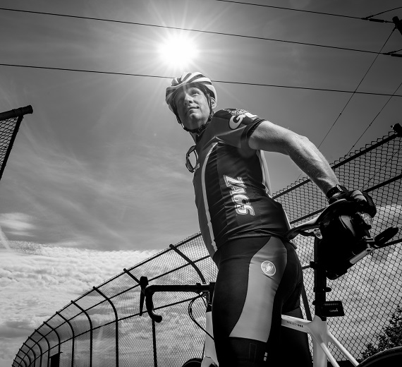 Scott Starbuck stands by his bicycle.