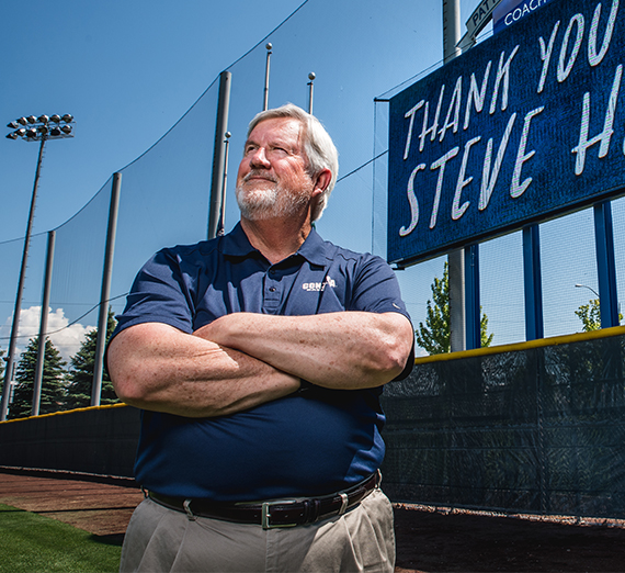 Coach Steve Hertz Stands in center field at Patterson Baseball Complex. 