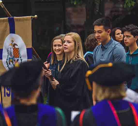 Members of the Class of 2021 take part in the "Welcome Walk" en route to the Academic Convocation on Aug. 28. (GU photo)