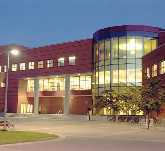 Exterior 1992 picture of the front of Foley, at dusk with lights in the windows