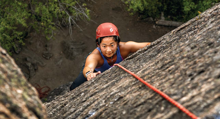 A Gonzaga student rock climbs