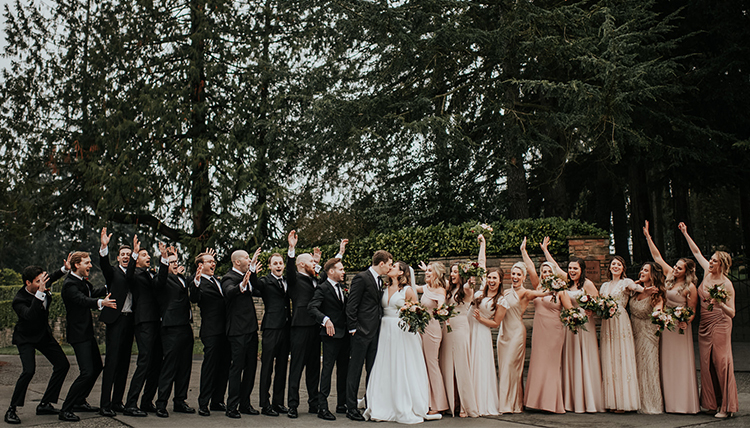 large wedding party in black and rose