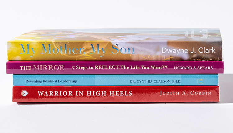Image of four books written by Gonzaga alum recently.