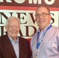 Gregg Hersholt poses with former Unites States President, Jimmy Carter.