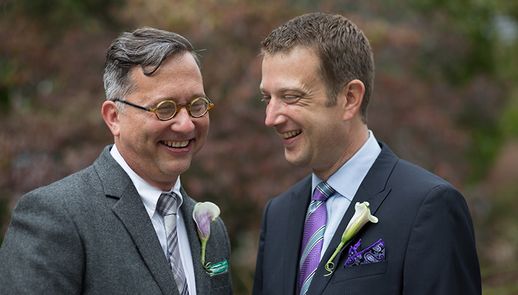 two men in suits for their wedding
