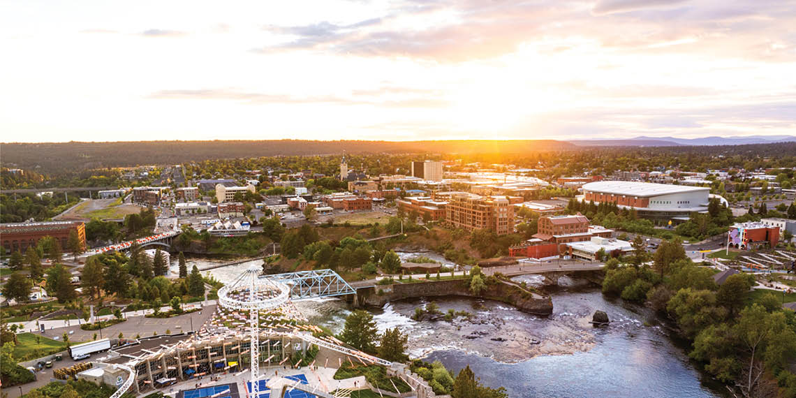 Aerial view of Riverfront Park in Spokane at sunset.
