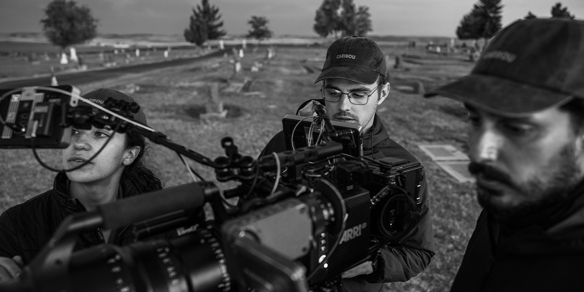 Jeff Rutherford pictured with two other people filming “A Perfect Day for Caribou”