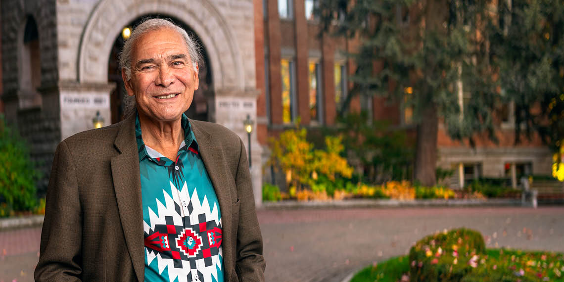 Reyes posed in front of College Hall