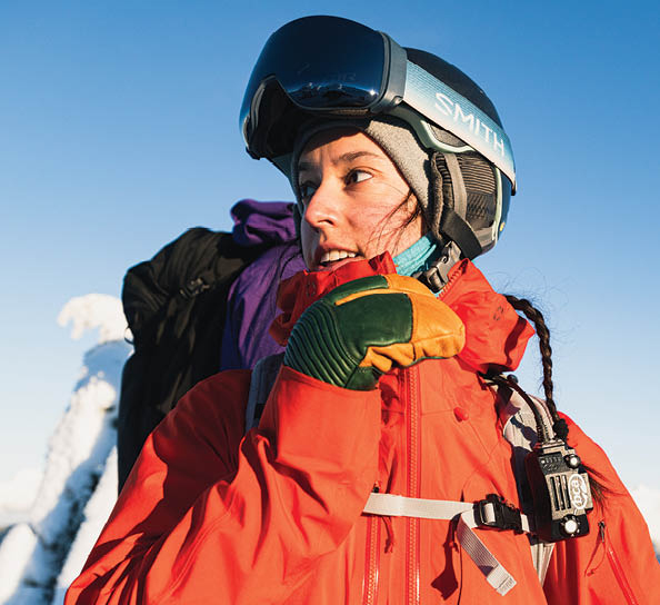 Close up of Ellen Bradley in snow gear on a snowy mountain