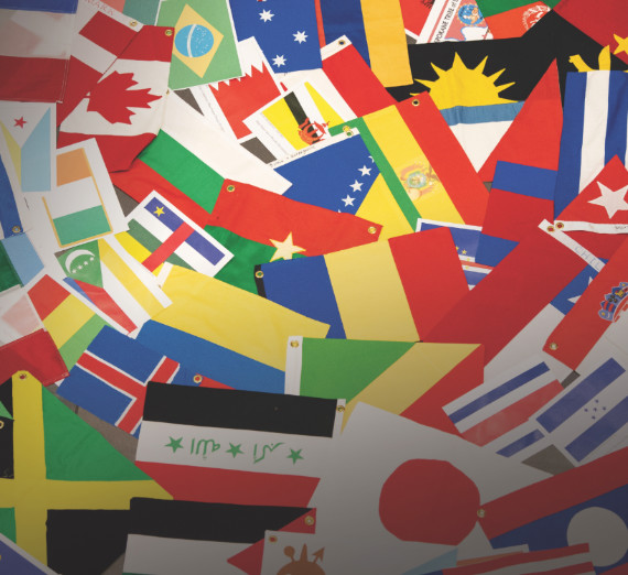 Paper flags of the world lay in a pile