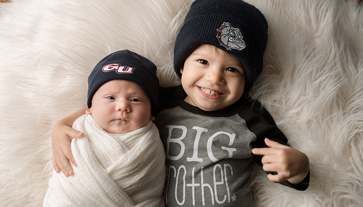 baby girl with big brother