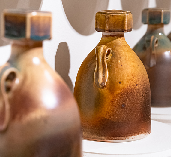Three growlers with screw top lids, cast porcelain by Mat Rude