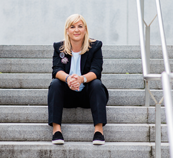 business woman sitting on steps