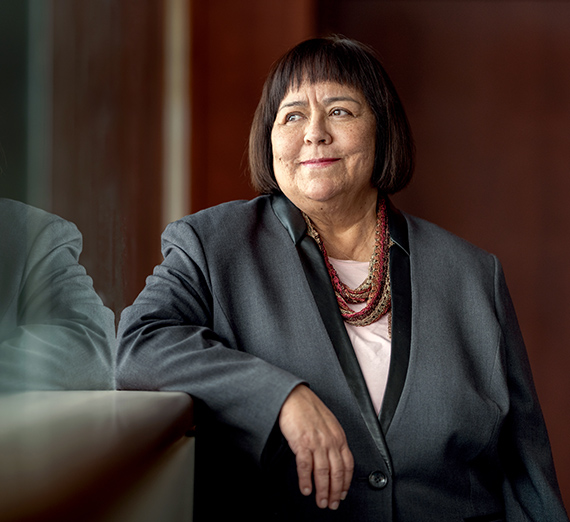 Deena Gonzalez stands by a window. 