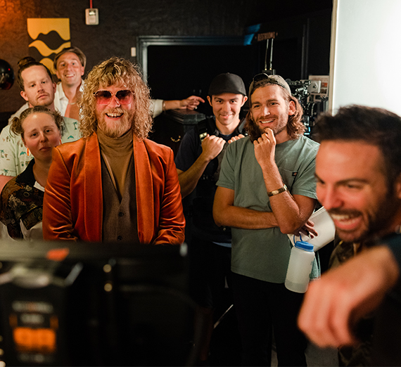 R&B recording artist Allen Stone (center) enjoys a preview of a video recorded by Offbeat Films. Surrounding him are Zags Jess Clement (left of Stone), Danny Chastain (top right), Taylor Pedroza (’13, middle right) and Thomas Ackels (bottom right). Actors included Matt Vergara (’15, inset) and Connor Brenes (’13). 