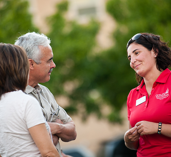 woman visits with college parents