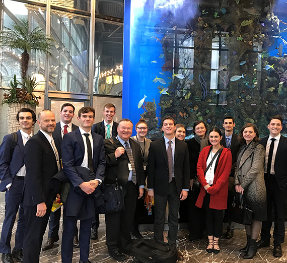 The London Trek group poses in the lobby of the Salesforce Tower. 