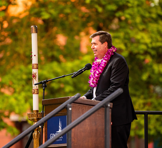 President McCulloh at podium in outdoor ceremony