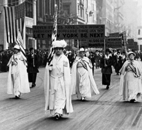 black and white image of women in the New York suffrage parade of the early 1900s