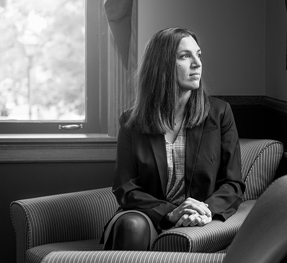 woman reflects in black and white photo