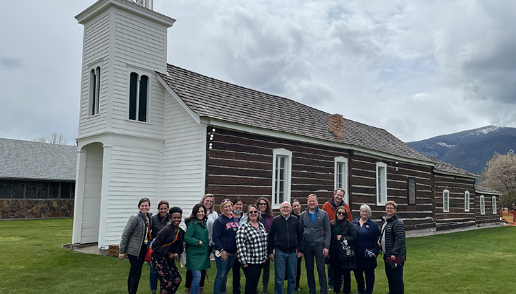 group of people in front of chapel at St. Marys Mission