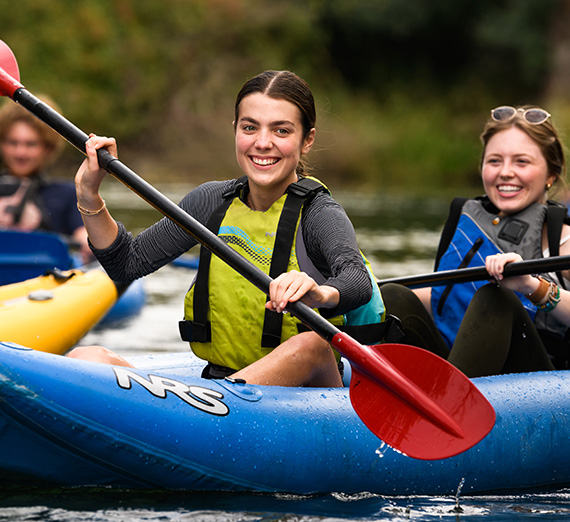 Students in Gonzaga's Immersive Outdoor Learning program kayak on the Little Spokane River. 