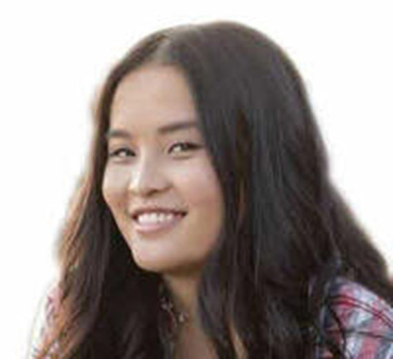Woman with brown hair and white background. 