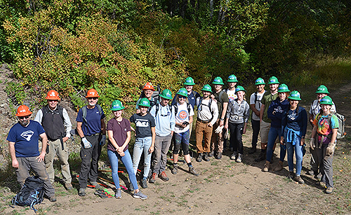 Gonzaga students in an environmental studies course conduct a service-learning project building a new trail with the Washington Trails Association on the recently acquired Mica Peak conservation land. (Photo courtesy Greg Gordon)