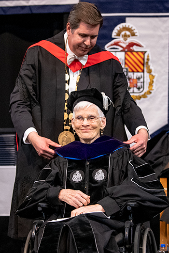 President Thayne McCulloh bestowed an honorary Doctor of Laws degree from Gonzaga University upon Judith Mayotte. (GU photo)