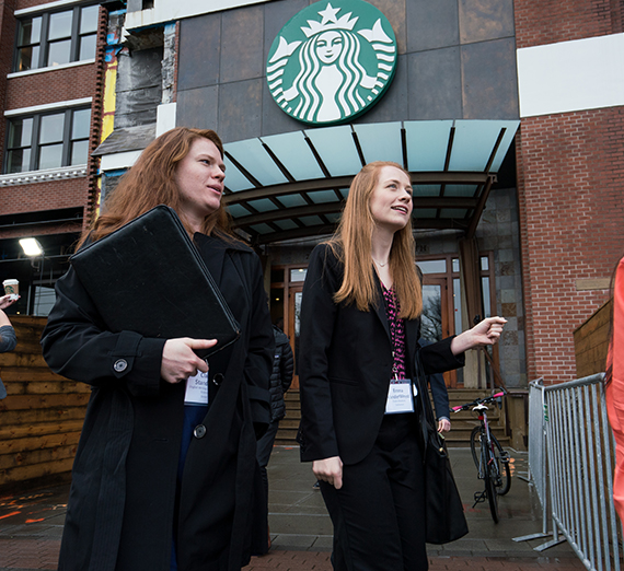 students exiting the Starbucks office at the Seattle Career trek