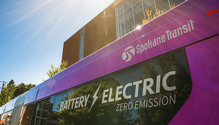 A Spokane Transit City Line bus with the words Battery Electric Zero Emission on the window