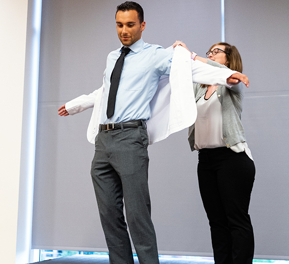 Ali Hakkani at the UW School of Medicine White Coat Ceremony in 2019. (UWSOM photo)