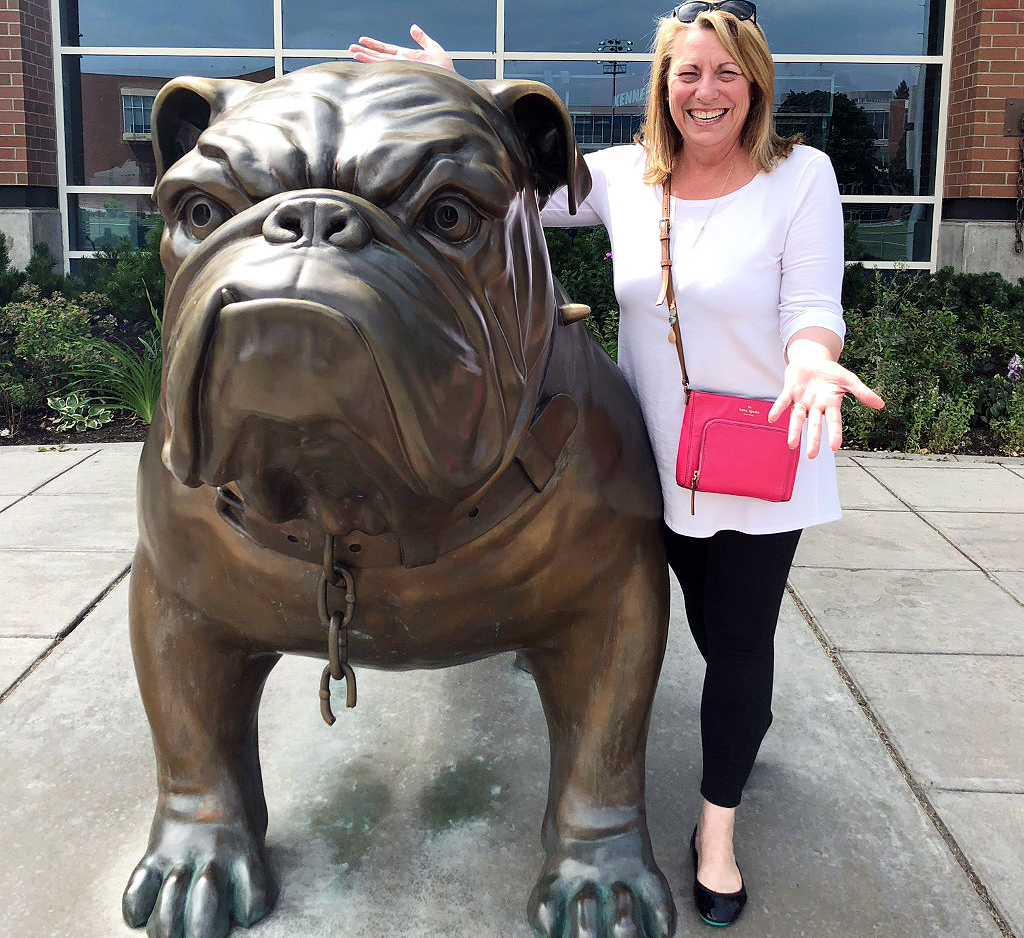 Heather Banis at the Gonzaga Bulldog statue.