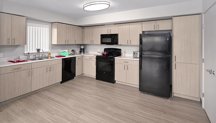 kitchen inside a new housing unit at Gonzaga Family Haven