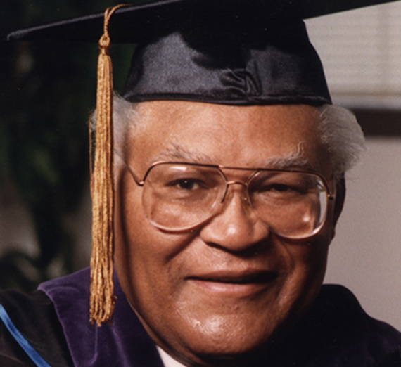 A picture of GU alumnus Carl Maxey in graduation regalia