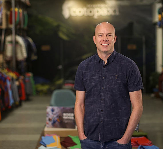 Davis Smith standing in a Cotopaxi store