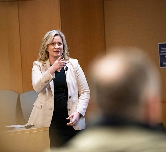 Gina Ligon points at someone asking a question in Hemmingson Auditorium