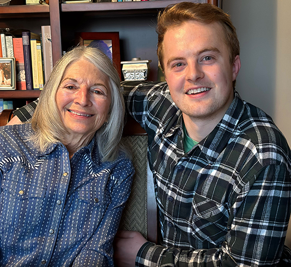 Linda Rodgers and Spencer Jacobs smile at the camera