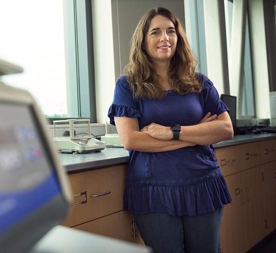 Chemistry and biochemistry professor Jennifer Shepherd stands in a lab
