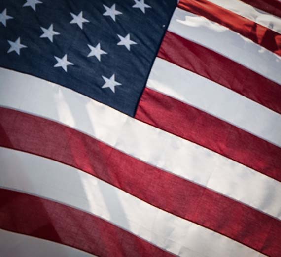 Closeup of US stars and stripes flag.